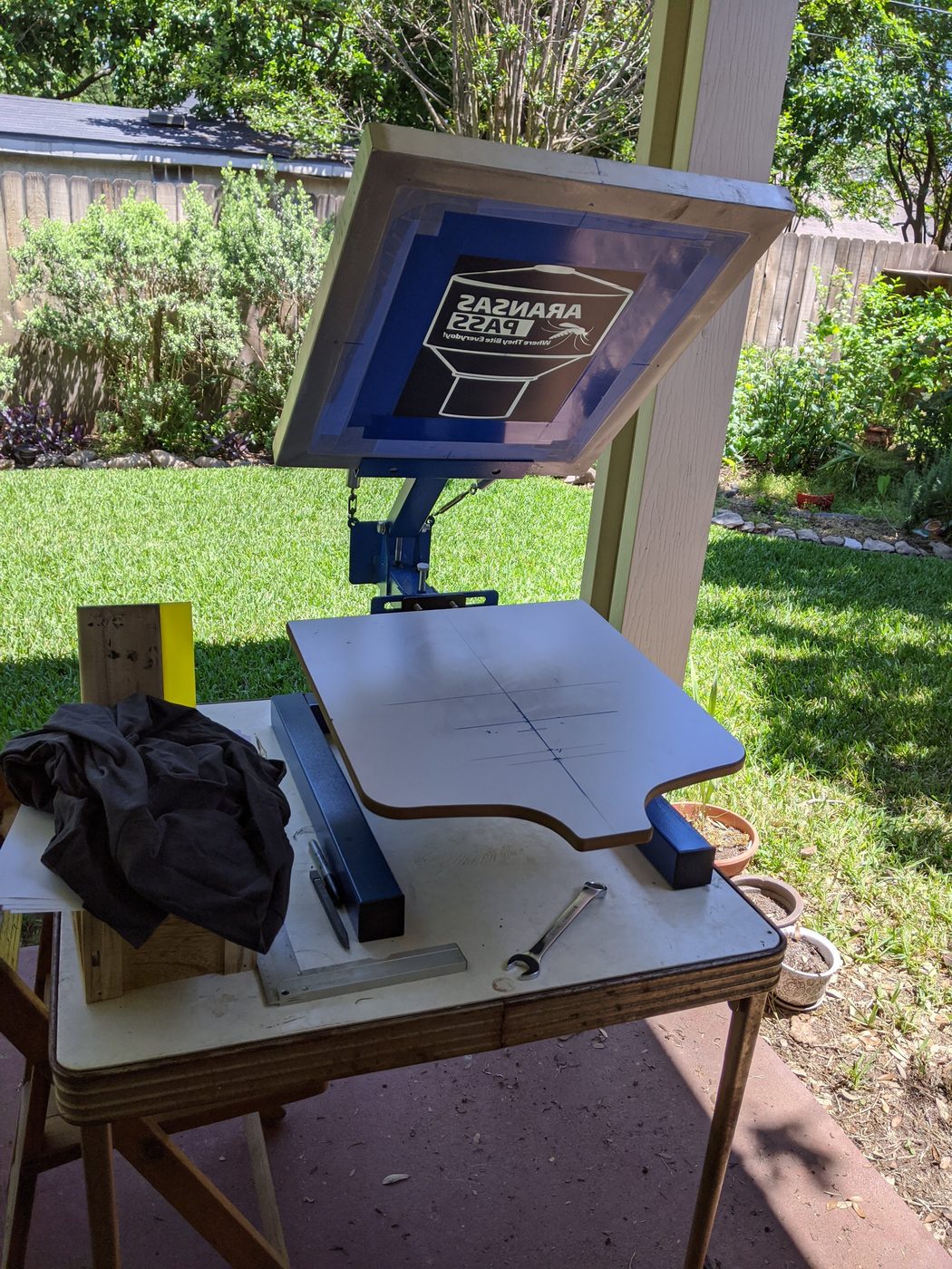 Screen printing press with the mosquito water tower design