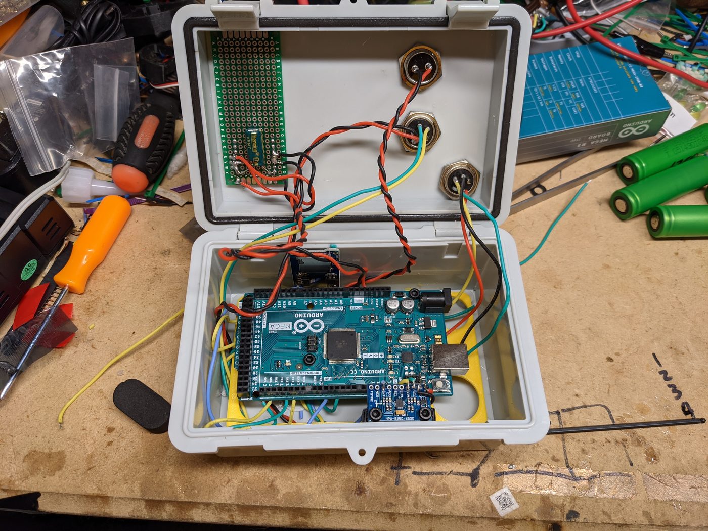 Open enclosure showing the Arduino Mega, GPS module, and internal wiring