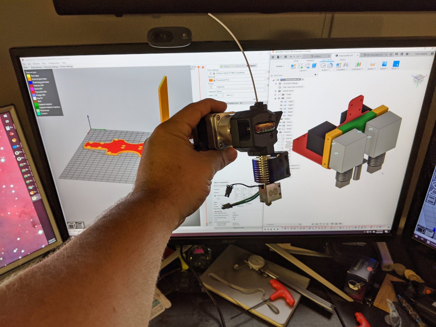 Extruder design in Fusion 360 alongside the physical build