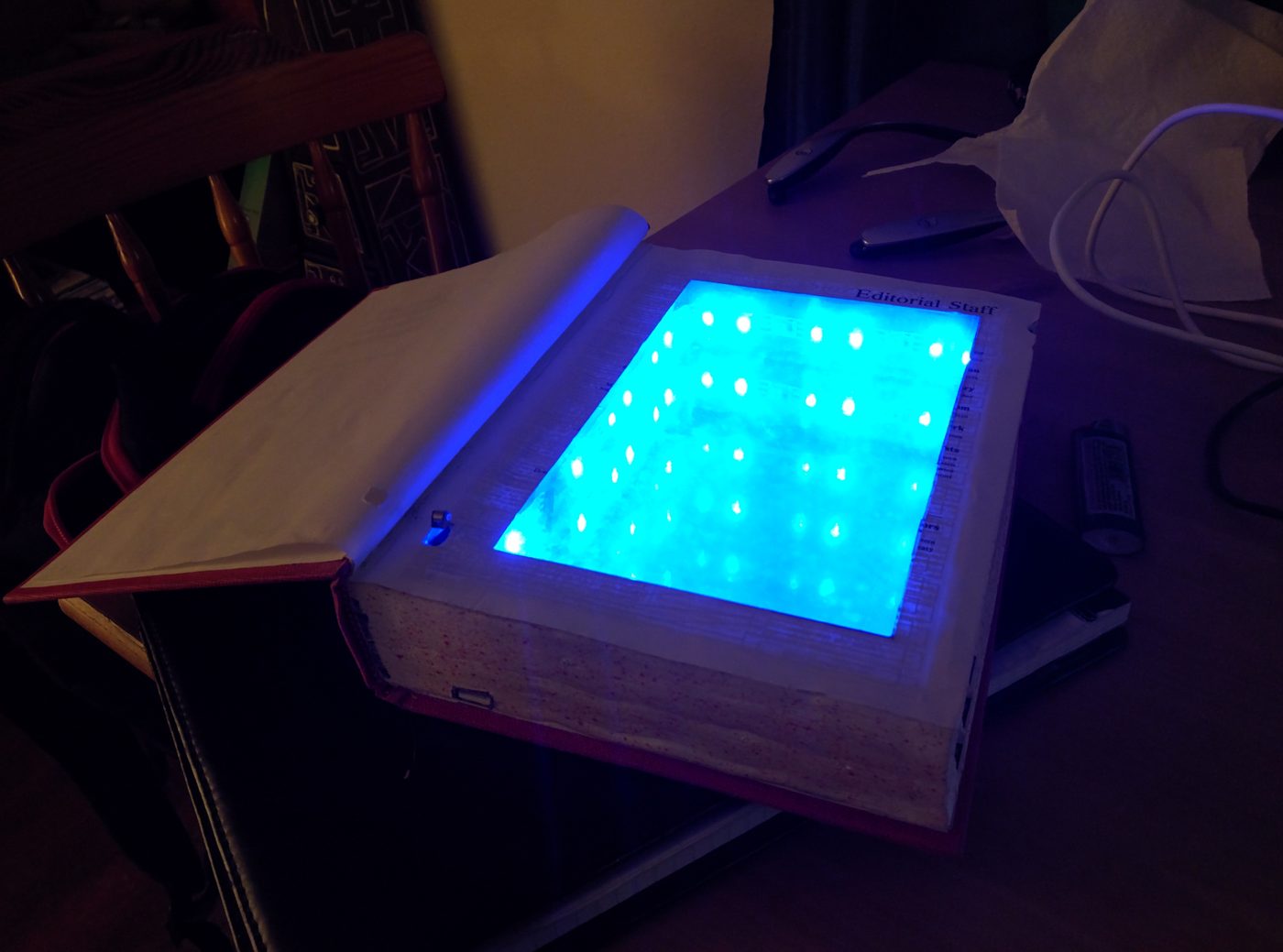 Dictionary glowing blue from embedded LEDs